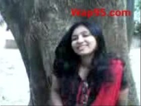 Indian college couple kiss outdoor